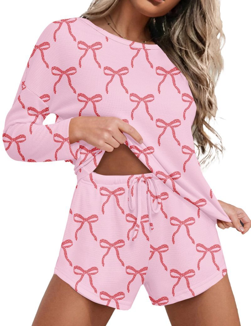 Waffle knit lounge set: long-sleeve crew top and shorts, red bow pattern, pockets