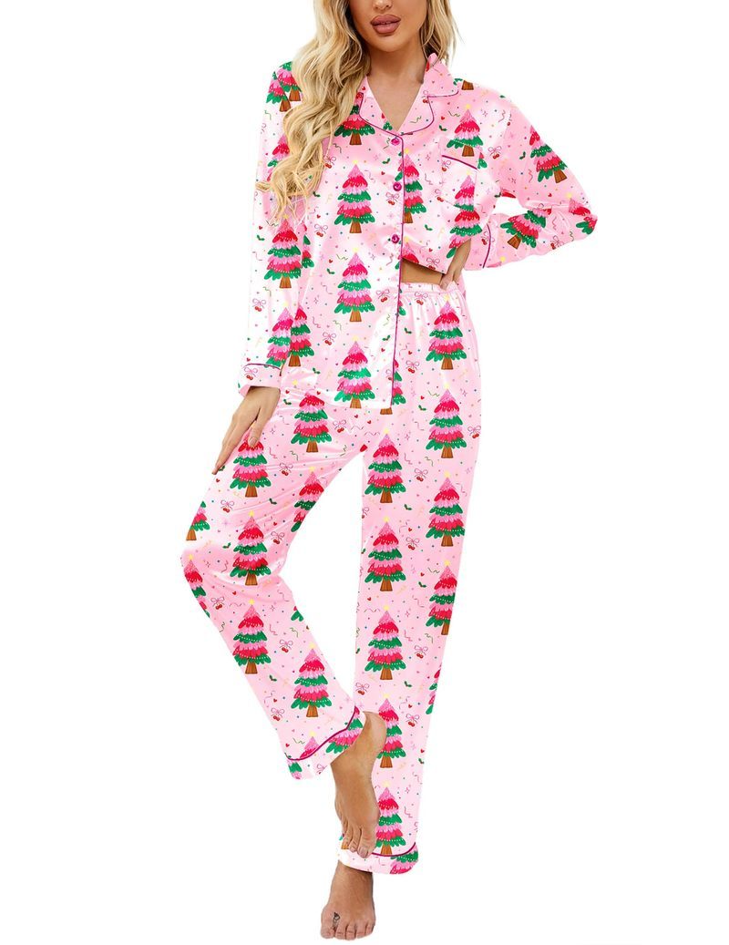 Pink Christmas satin pajama set with green tree print, button-front long sleeve top and pants