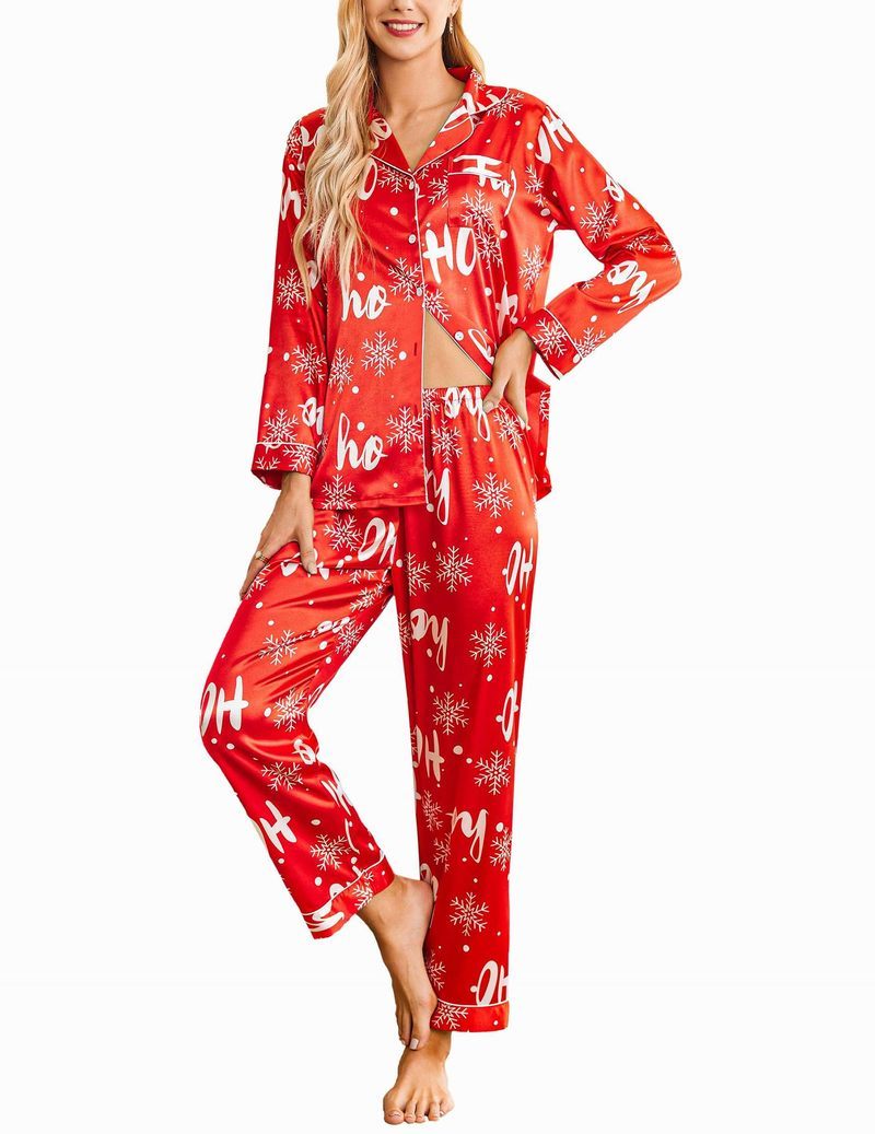 Red Christmas satin pajama set with white 'Ho Ho Ho' print, button-front long sleeves and pants