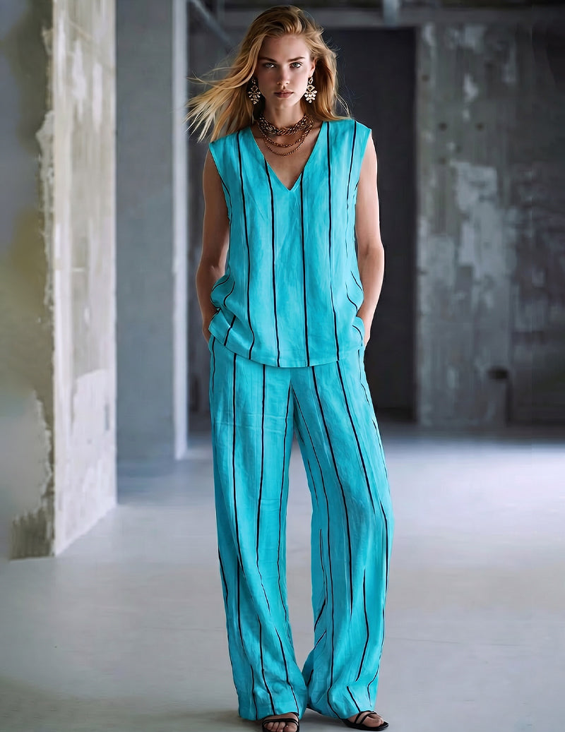 Lake blue ribbed V-neck jumpsuit with vertical stripes, slim fit, wide-leg pants