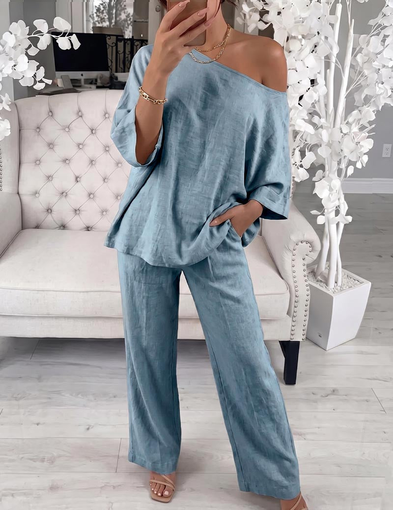 Blue off-shoulder lounge set with loose top and wide-leg pants