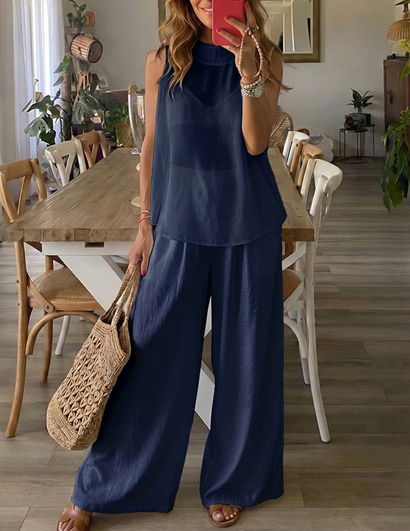 Navy blue lounge set with sleeveless tunic top and draped wide-leg pants
