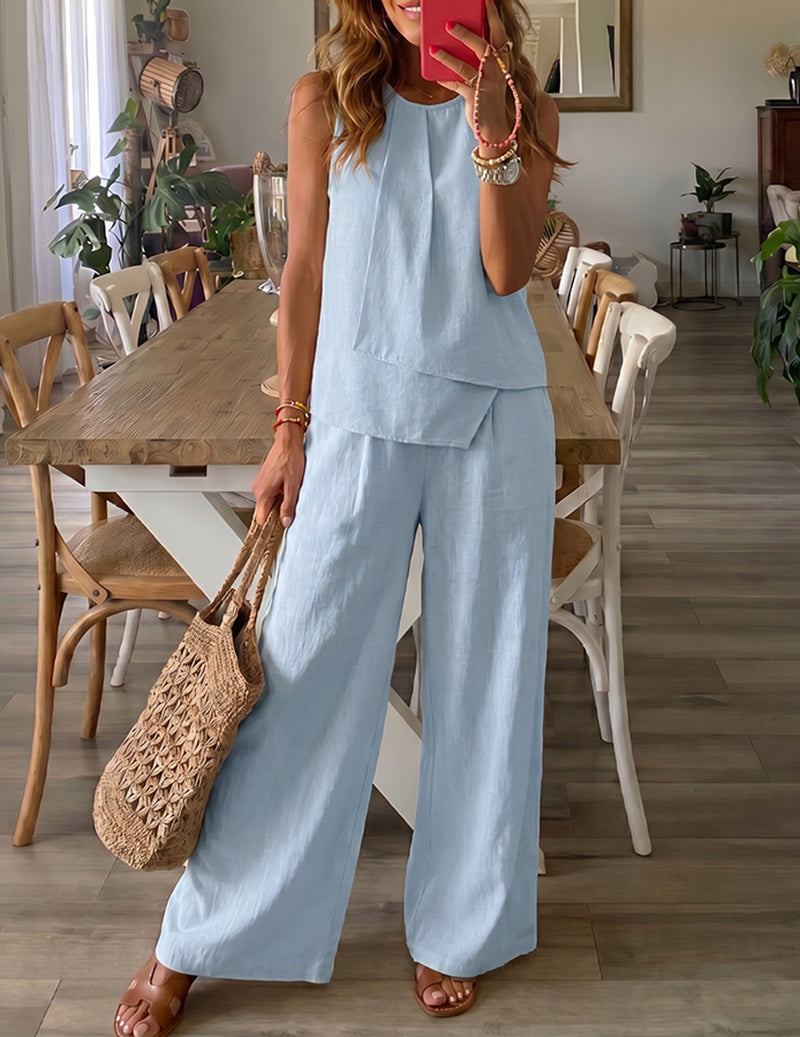 Light blue sleeveless lounge set with layered tier top and wide-leg pants.