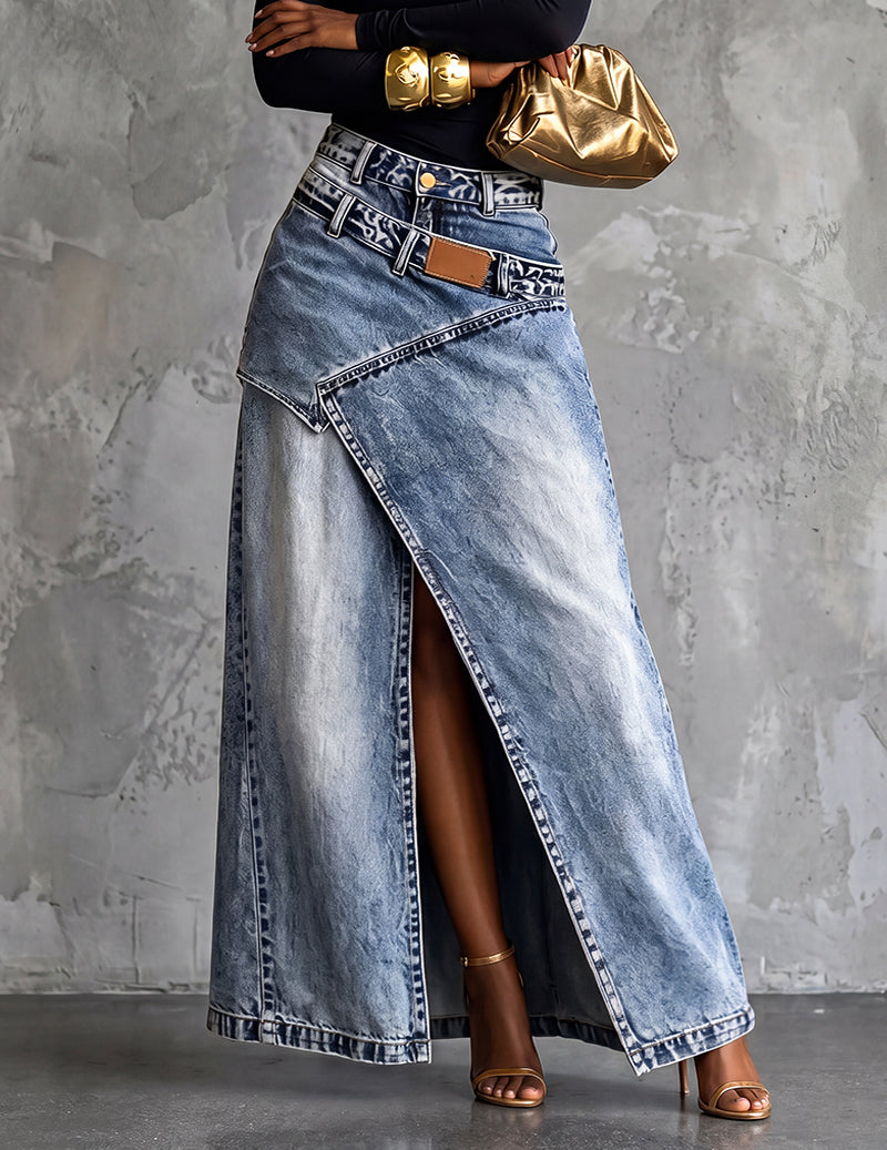 Denim midi skirt in light blue with front slit, side pockets, belt loops, and tan patch