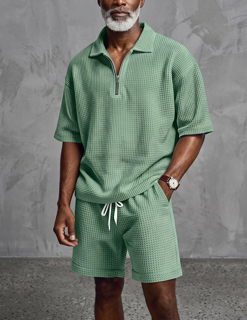 Men's green waffle-knit short-sleeve quarter-zip polo with drawstring shorts set
