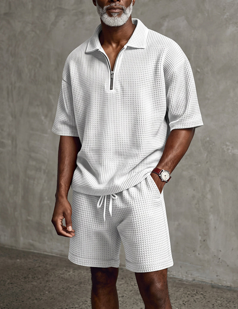Men's white waffle-knit quarter-zip polo and drawstring shorts set