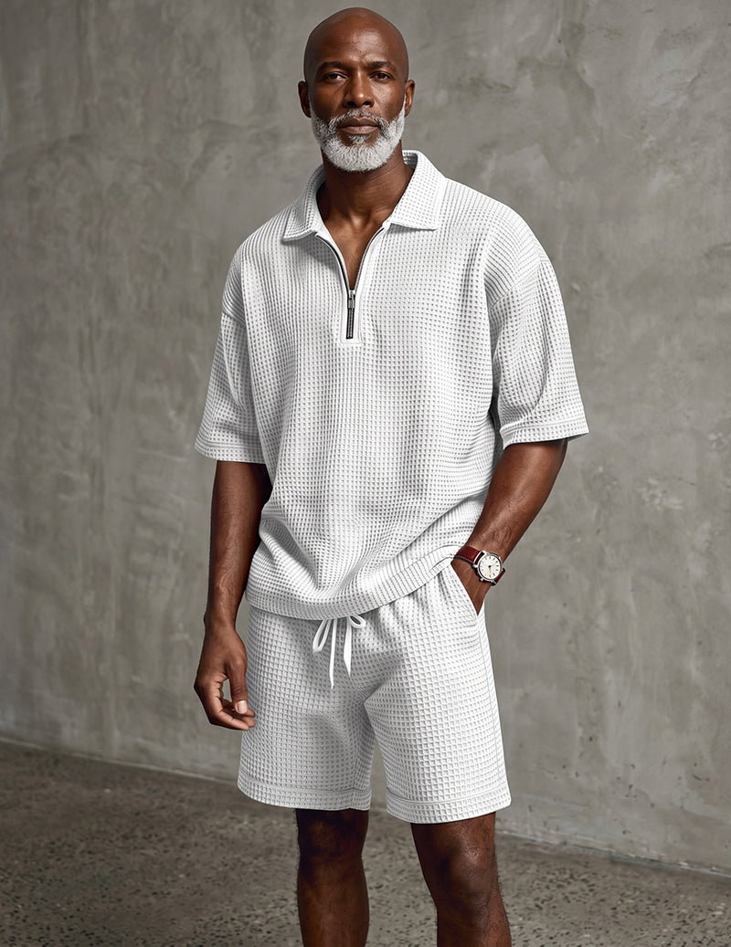 Men's off-white waffle-knit quarter-zip polo and drawstring shorts set