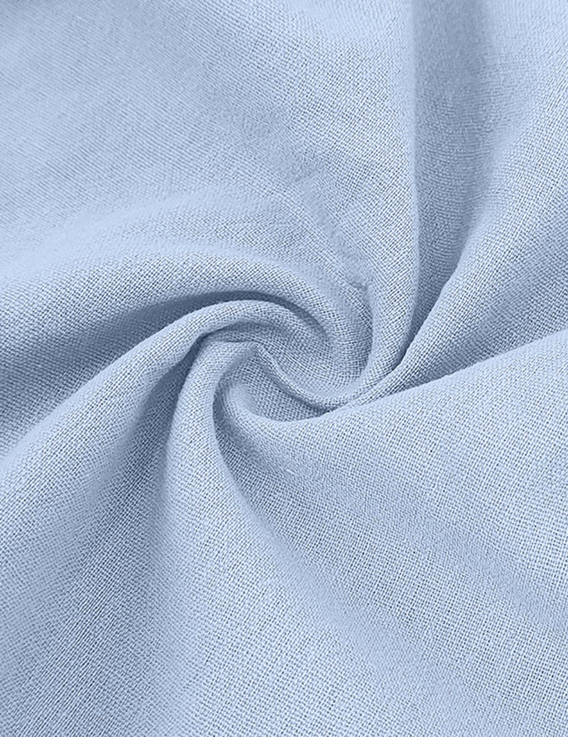 Close-up of light blue linen fabric texture with subtle woven pattern