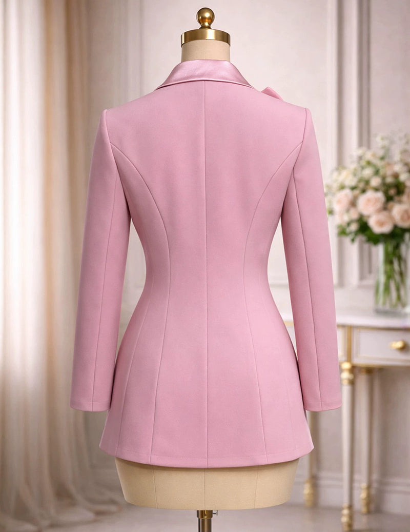 Pink satin blazer on mannequin, back view with tailored seams, long sleeves