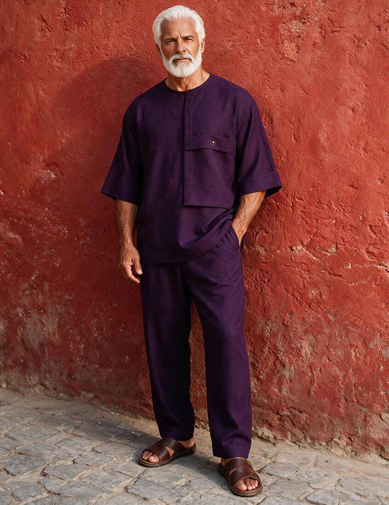 Men's deep purple two-piece loungewear set featuring a patch-pocket top and ankle pants