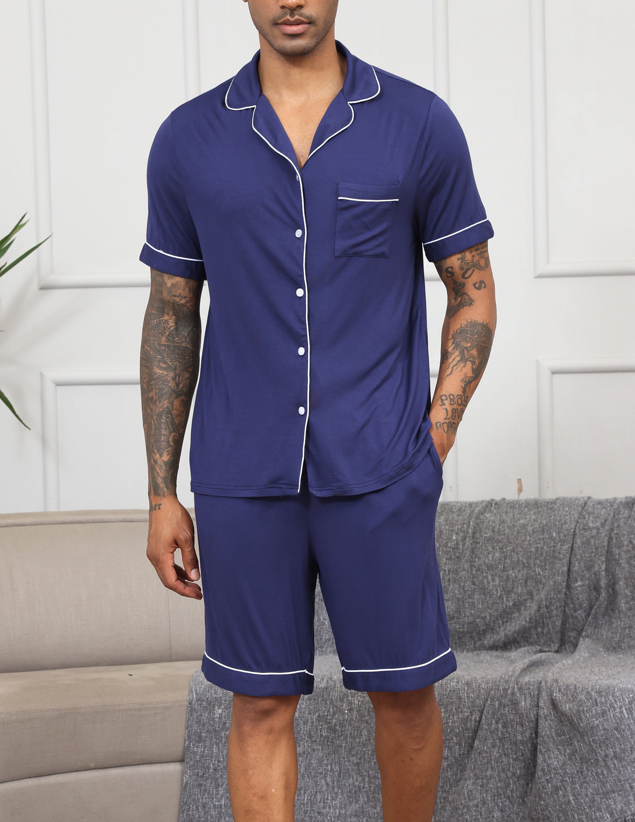 Men's navy notch-collar short-sleeve pajama set with button front and matching shorts.