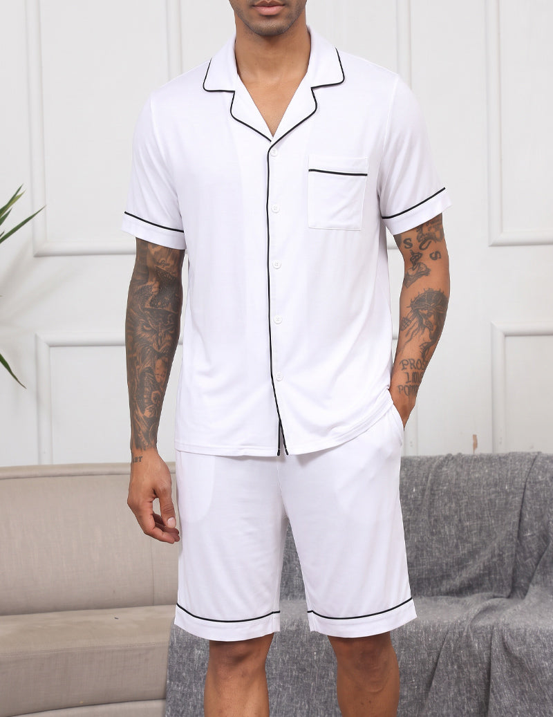 Men's white notch-collar short-sleeve pajama set with button front and matching shorts.
