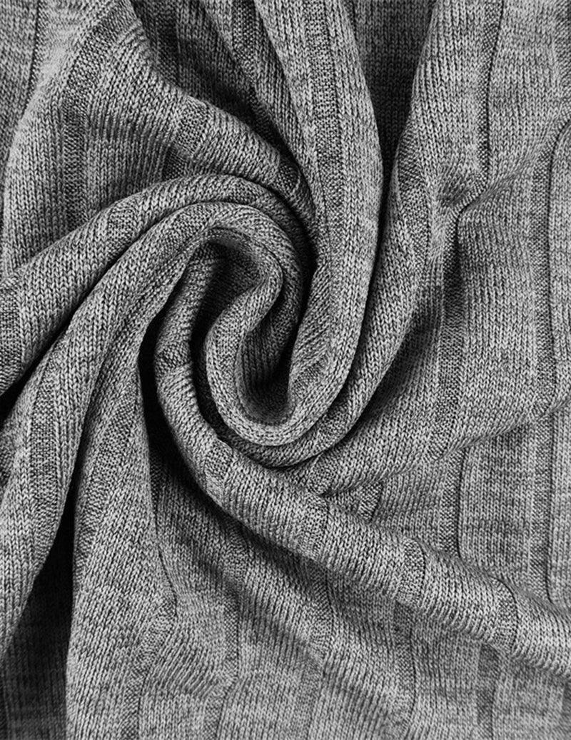 Close-up of waffle knit fabric in light gray, soft textured weave