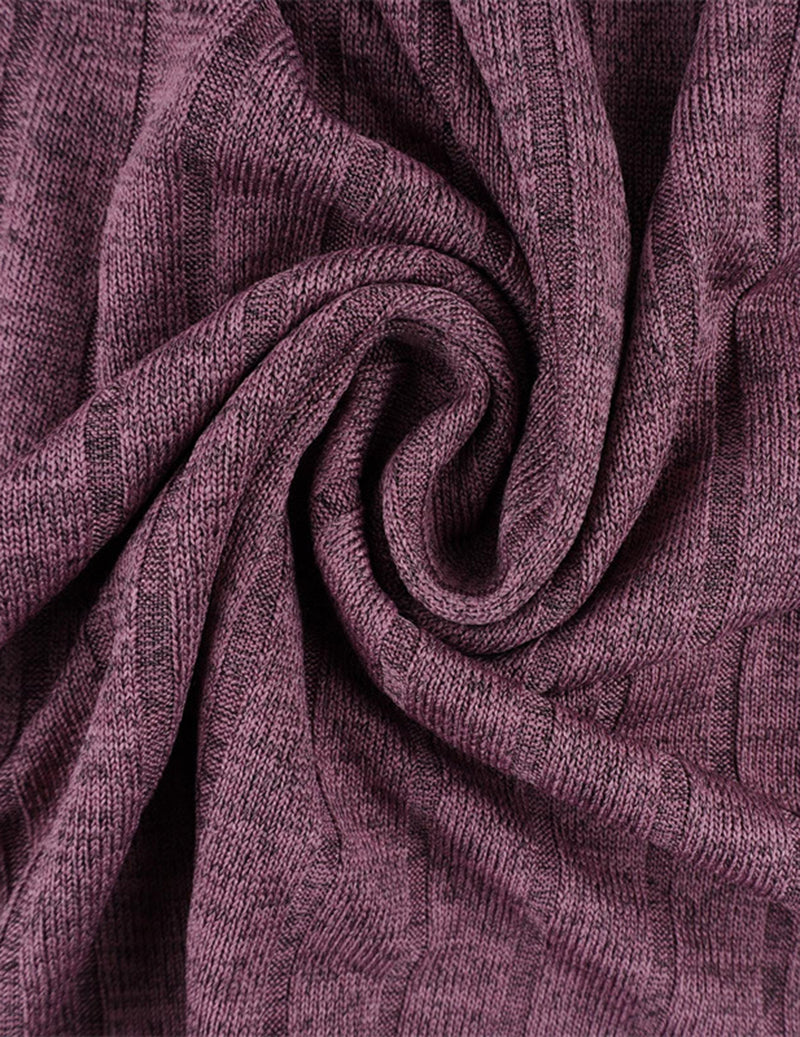 Close-up of waffle knit fabric in wine-purple, soft textured weave