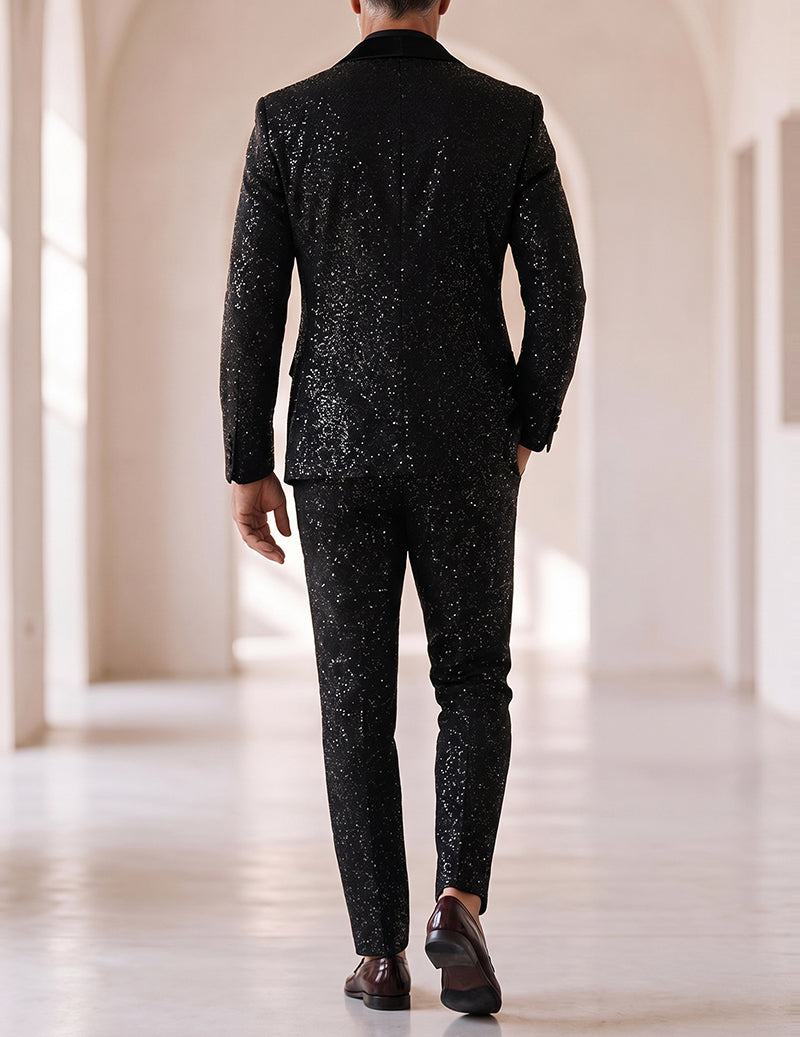 Black sequin blazer and pants set shown from back, slim trousers