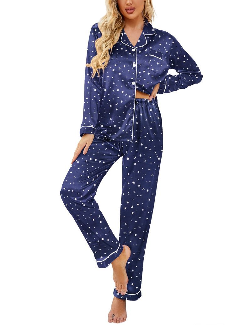 Navy Christmas satin pajama set with white star-speckle print, button-front long sleeve top and pants