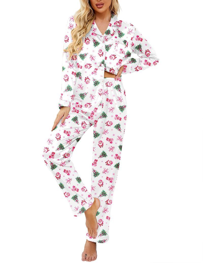 White satin pajama set with red and green holiday print, button-up top and pants