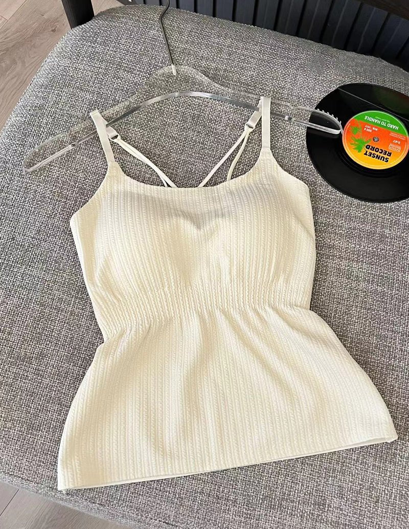 Light cream adjustable spaghetti strap camisole with textured knit and scoop neckline
