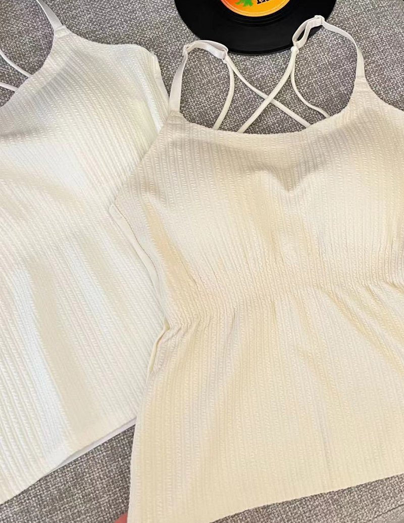 Cream adjustable spaghetti strap camisole, textured knit, crisscross back straps