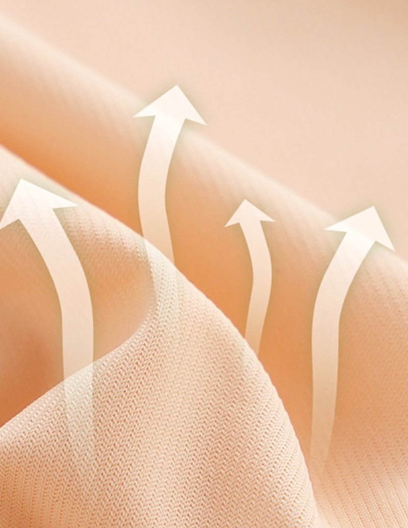 Beige high-waisted shaper shorts with textured compression fabric and contour arrows