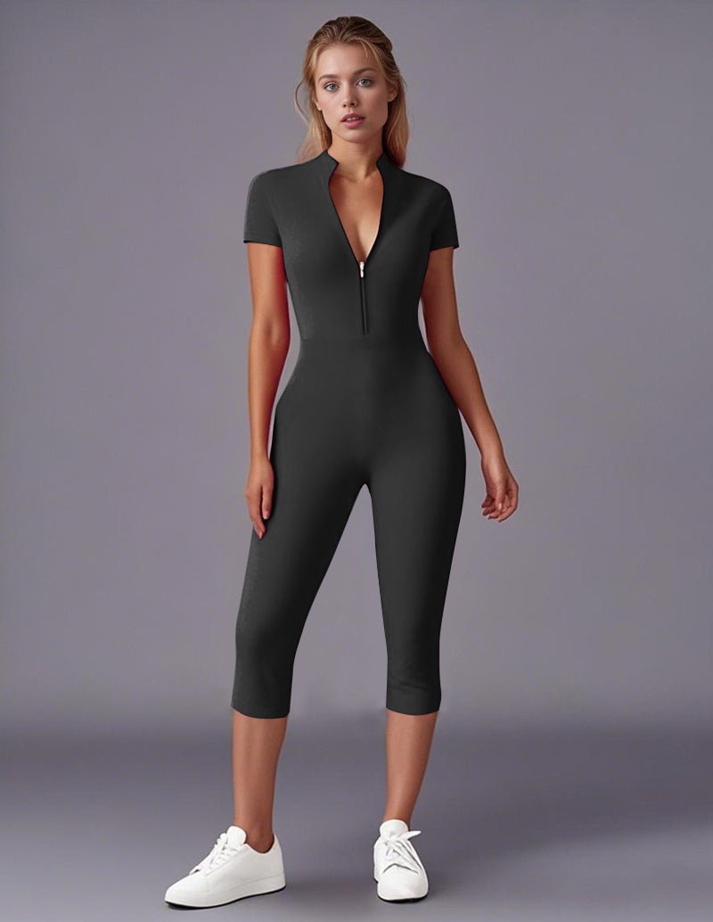 Black stretch zip-front jumpsuit with short sleeves, V-neck, and cropped legs