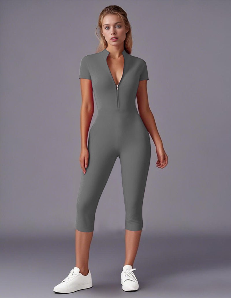 Gray stretch zip-front jumpsuit with short sleeves, V-neck, and cropped legs