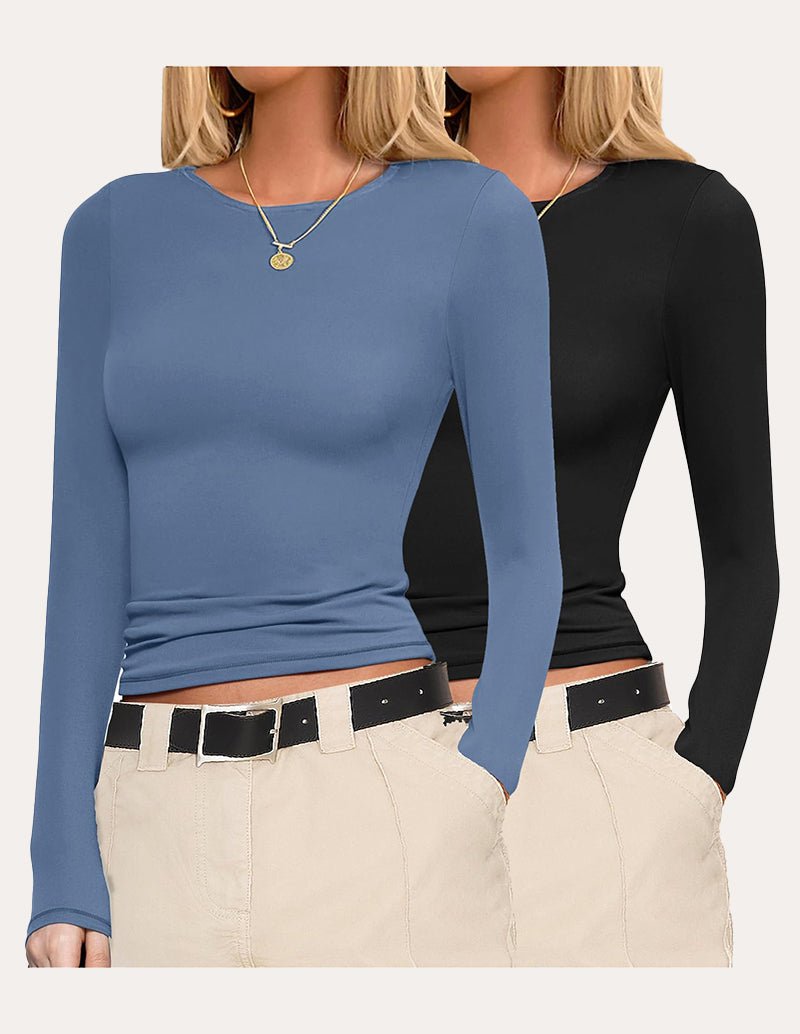 Blue long-sleeve slim-fit top with crew neck and cropped hem