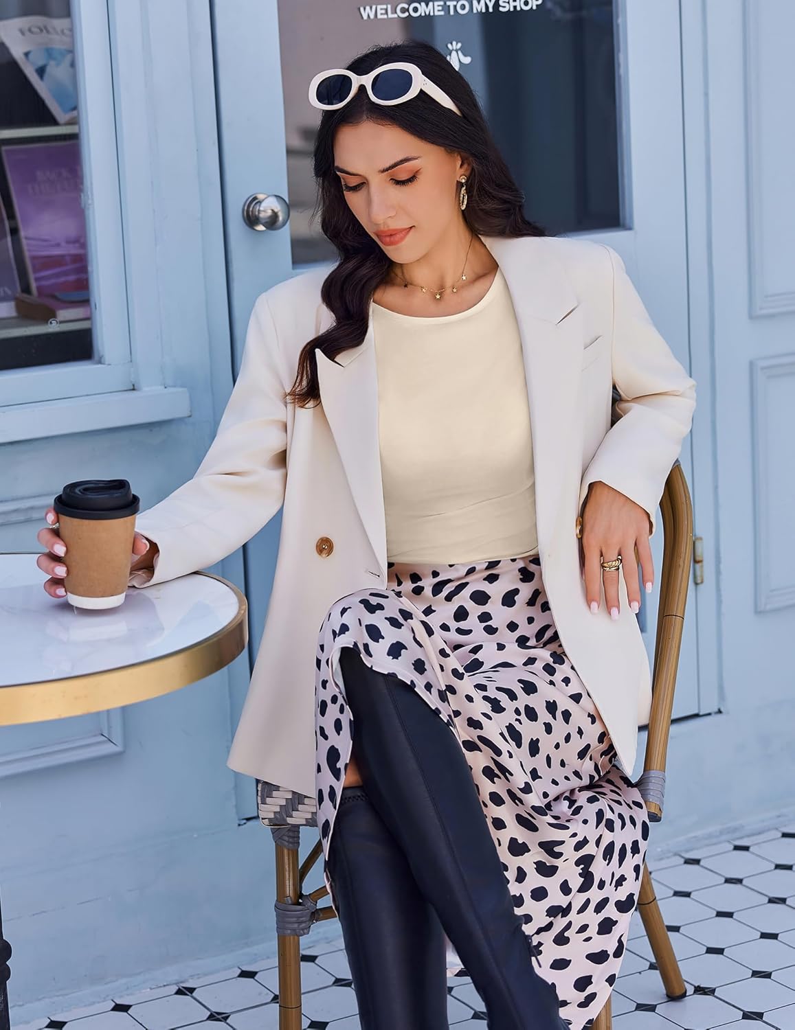 Cream long sleeve boat neck top with gathered ruching at the waist