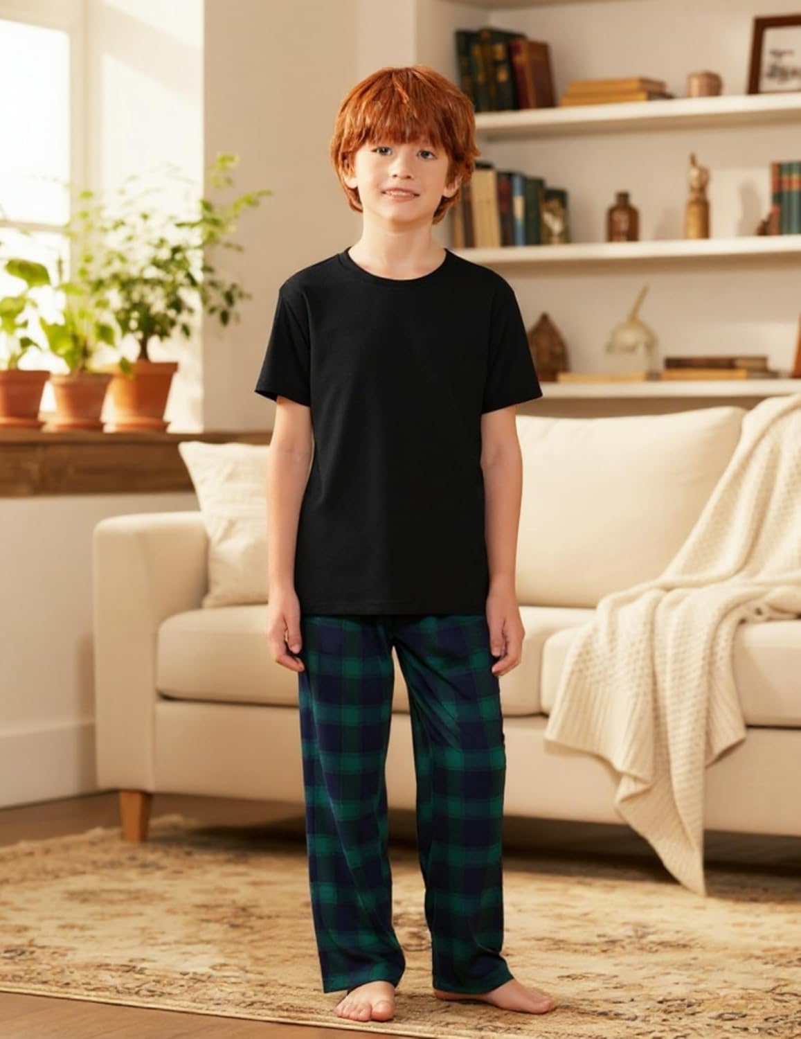 Boys green plaid pajama pants with elastic waistband; long relaxed fit.