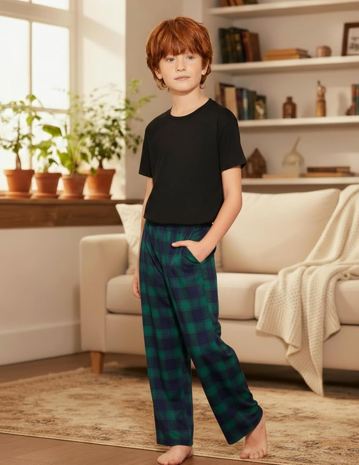 Boys dark green plaid pajama pants, soft knit look; elastic waistband and straight legs.
