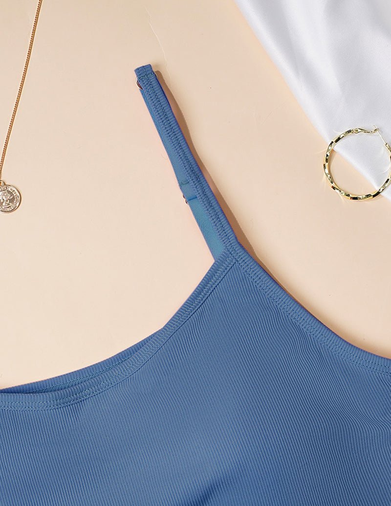 High-stretch camisole with built-in bra, blue, close-up of neckline and thin straps