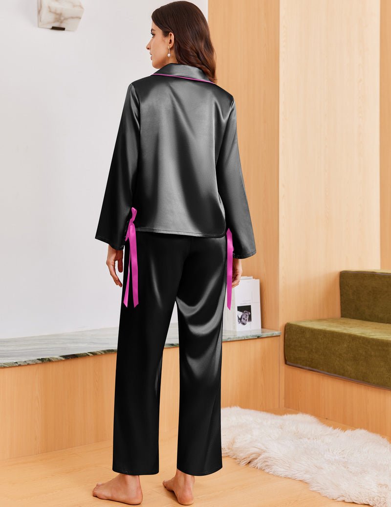 Black satin long pajama set, button-down style with purple ribbon ties (back view)