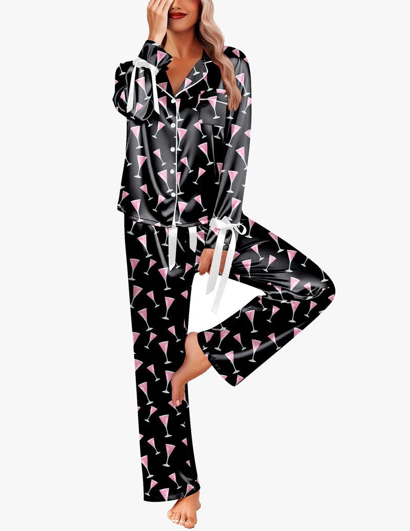 Black satin button-down pajama set with pink champagne glass print and tied waist