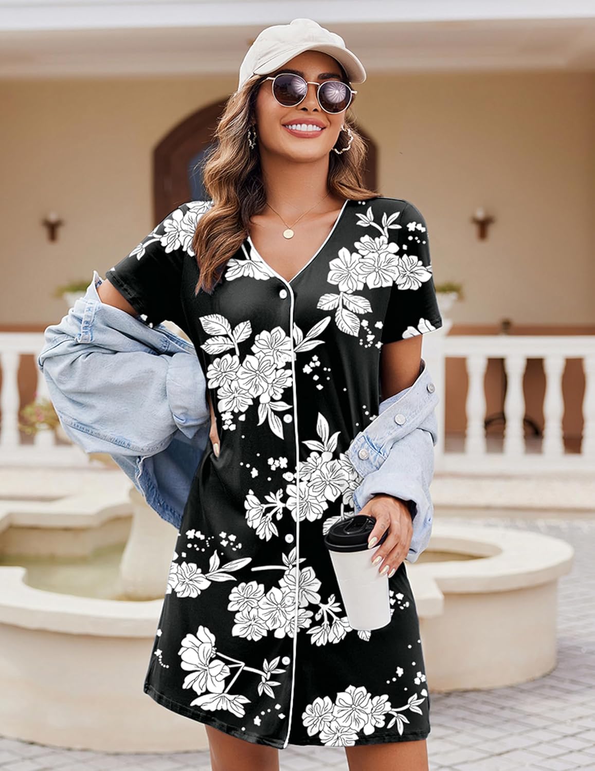 Short-sleeve button-front nightshirt with V-neck, black with white floral print.