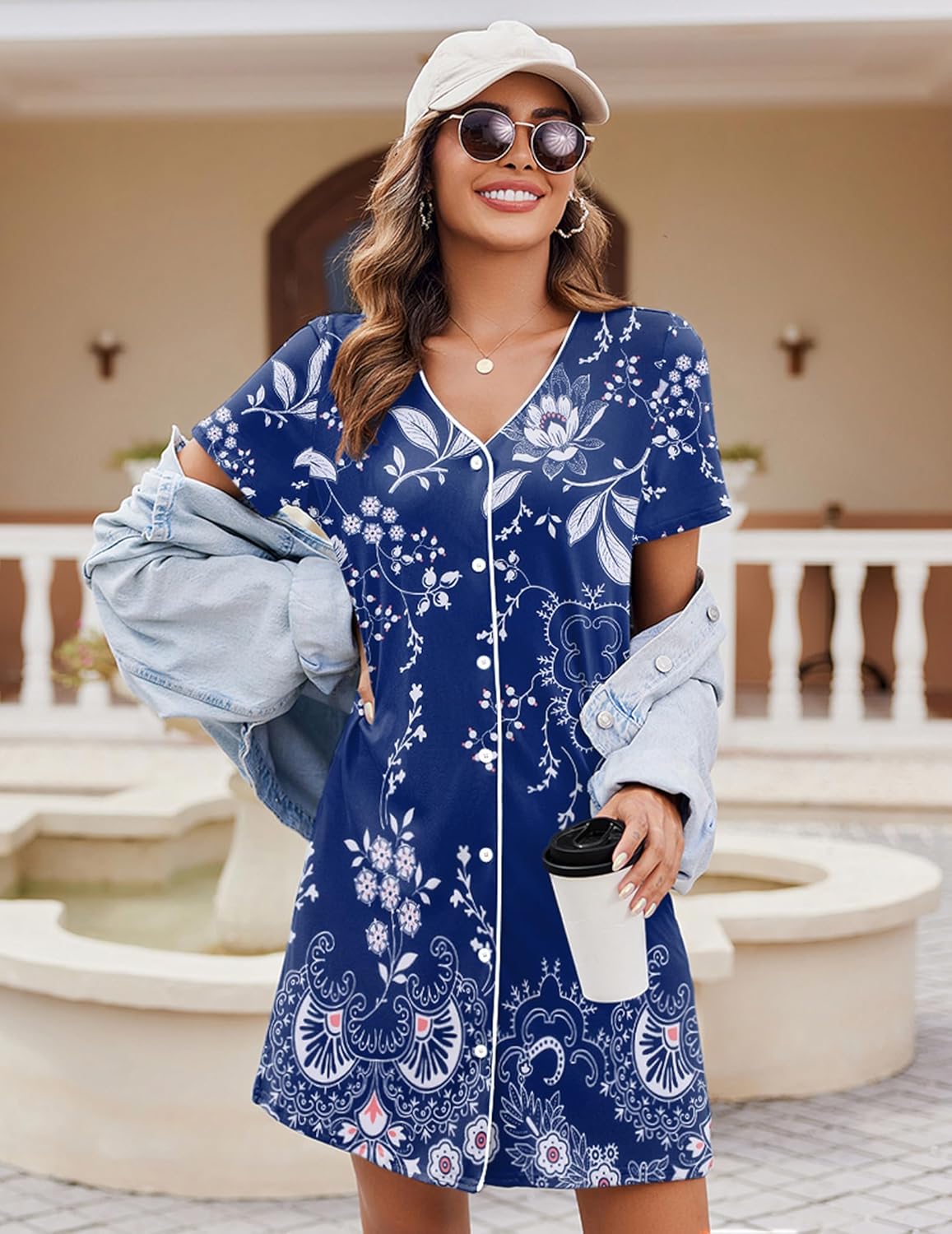 Short-sleeve button-front nightshirt with V-neck, navy with white floral decorative print.