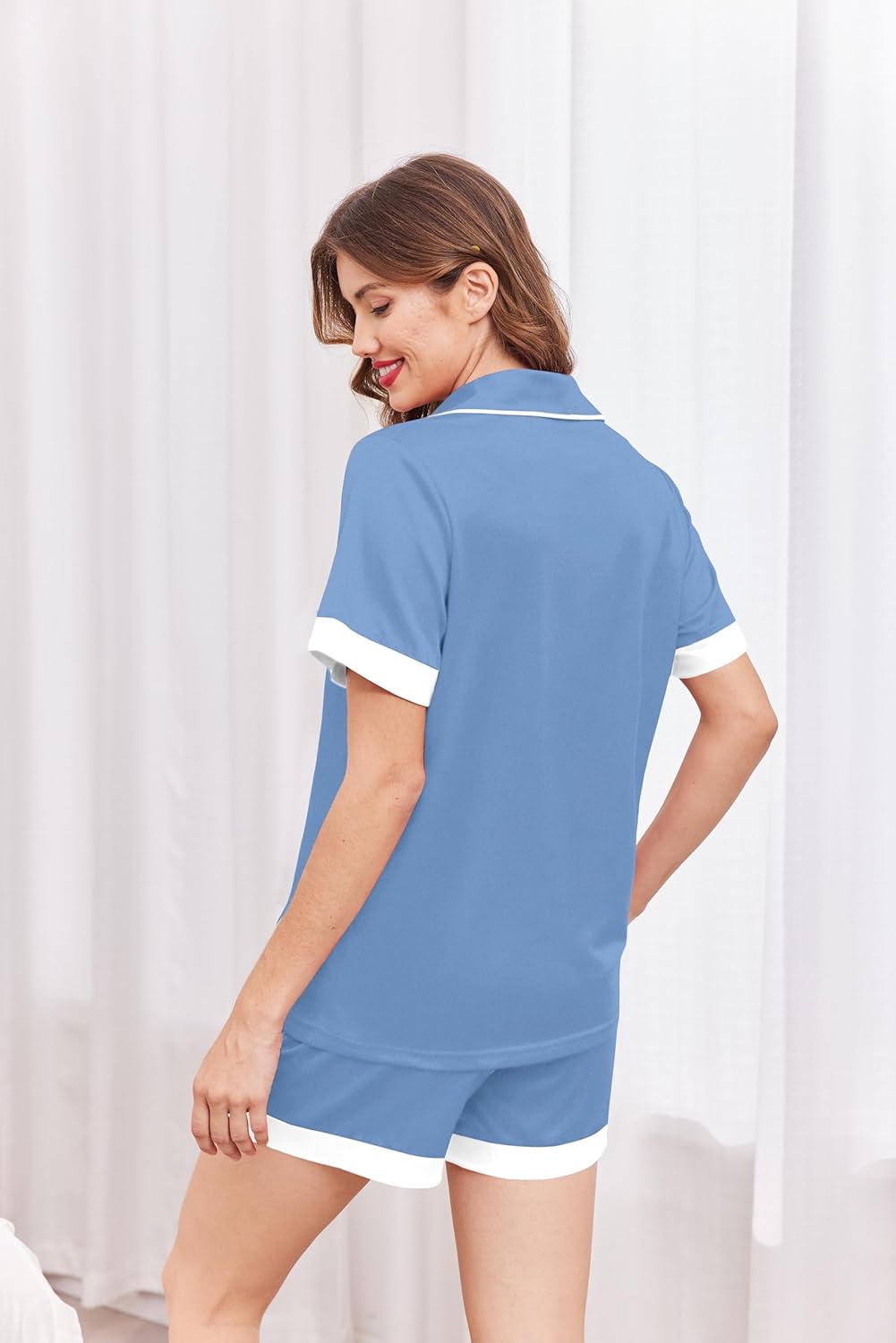 Blue pajama shirt with white-trim collar and matching shorts, back view