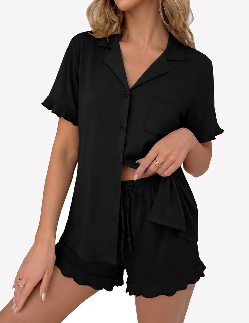 Black pajama lounge set with button-up short sleeve top and drawstring ruffle shorts