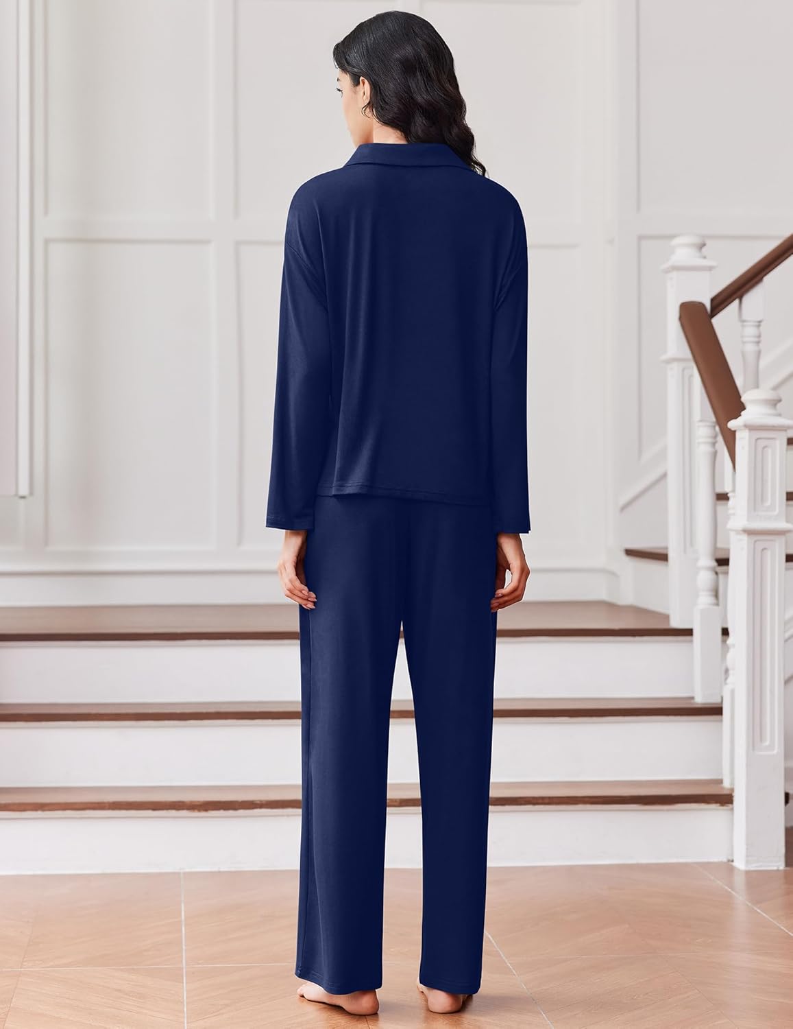 Navy pajama set, back view of long button shirt and full-length trousers