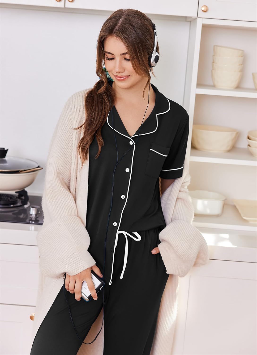 Black button-front pajama set with drawstring jogger pants and white piping