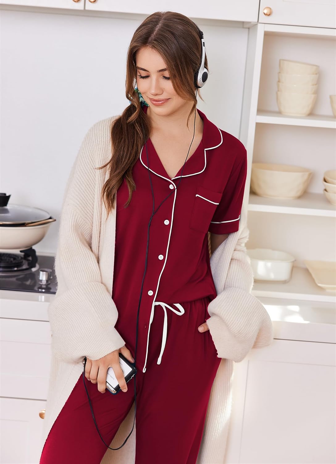 Women's button-front pajama set in dark red with white trim, chest pocket, drawstring joggers