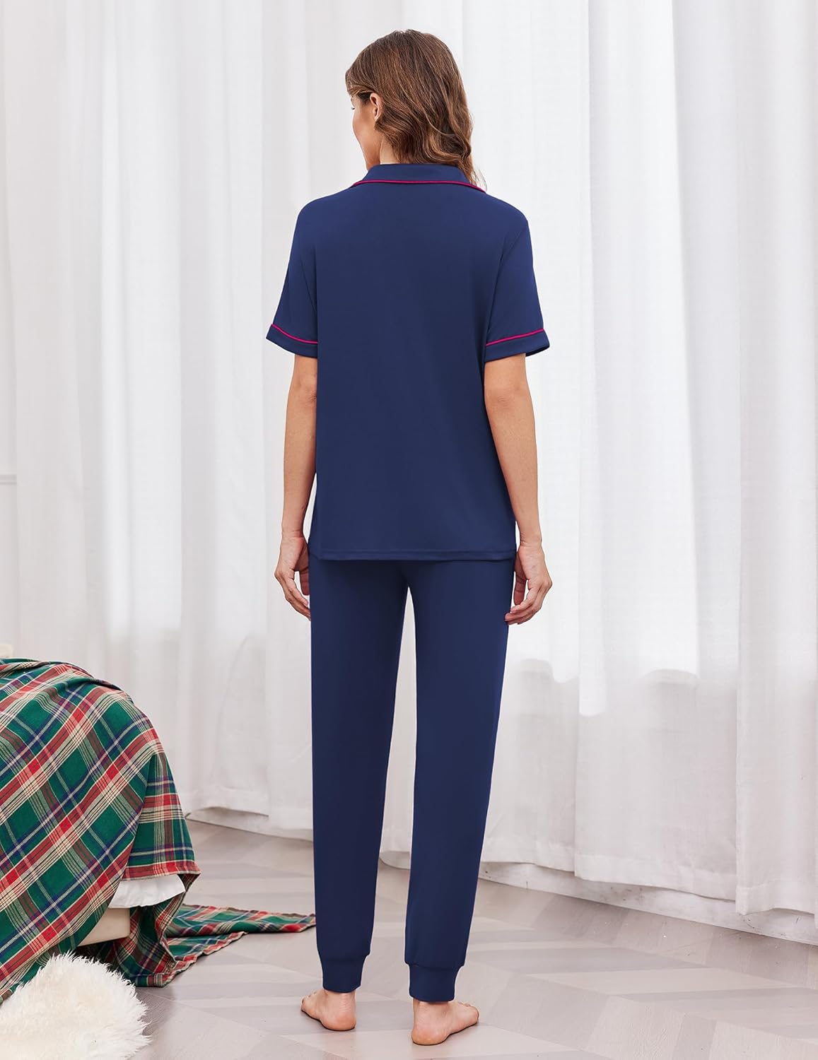 Navy pajama set back view with button placket and jogger pants, pink trim