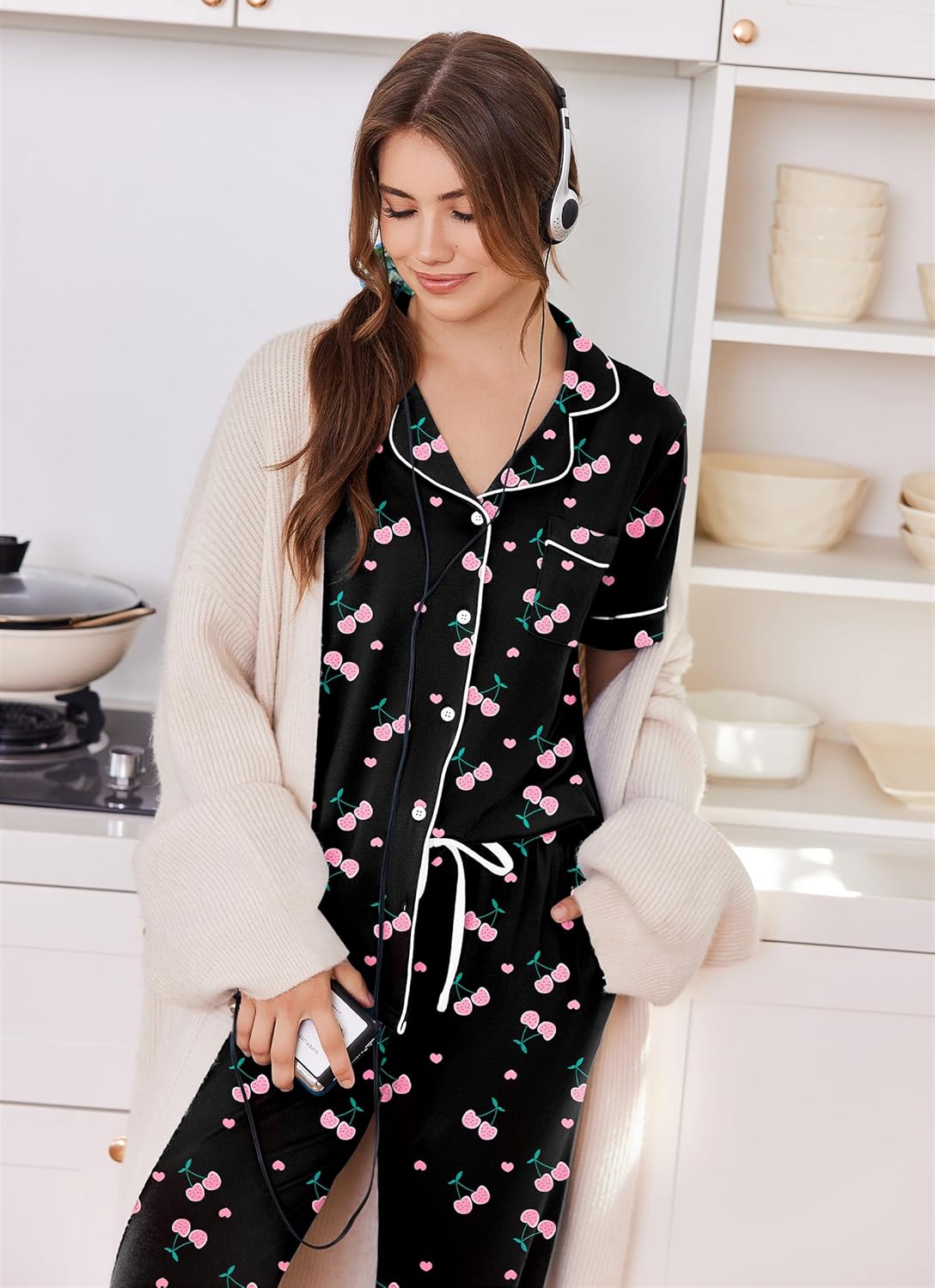 Black pajama set with cherry print, button front, and drawstring jogger pants