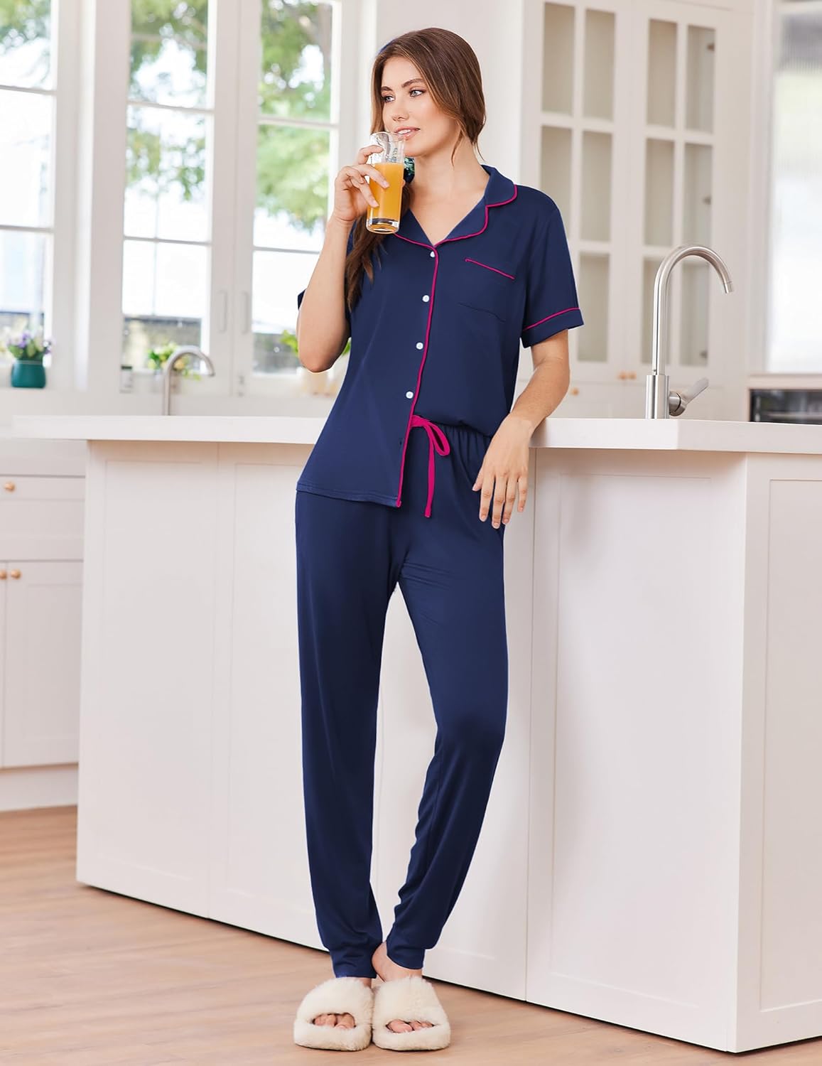 Navy pajama set with button front, pink piping, and drawstring jogger pants