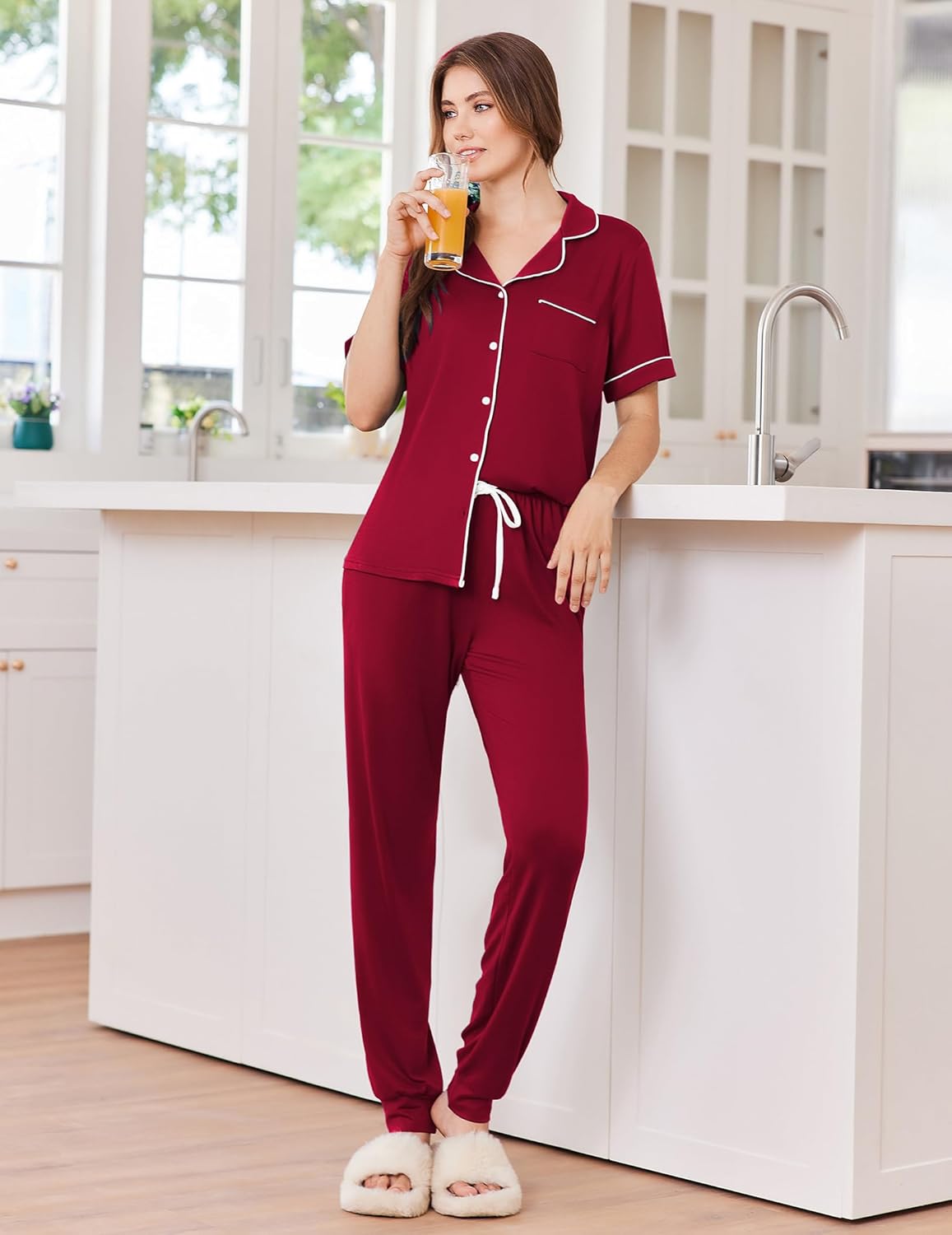Women's button-front pajama set in dark red with white trim and drawstring jogger pants
