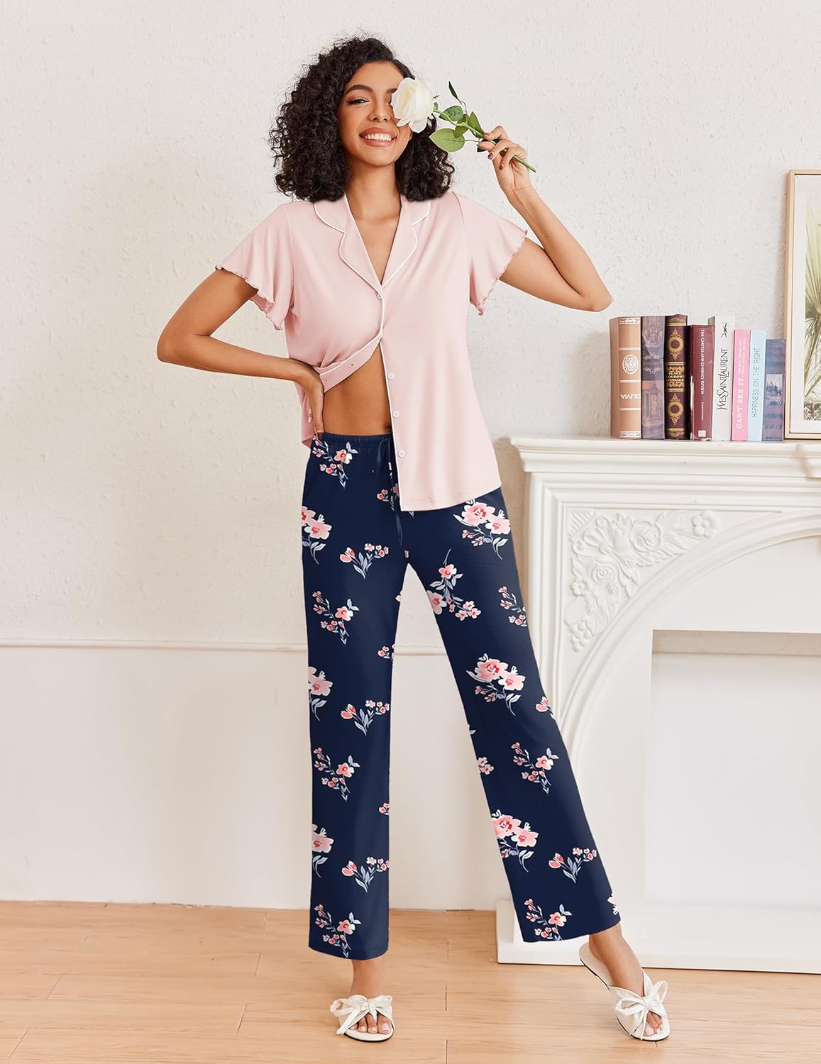 Light pink button-up pajama top with short sleeves paired with navy floral wide-leg pants