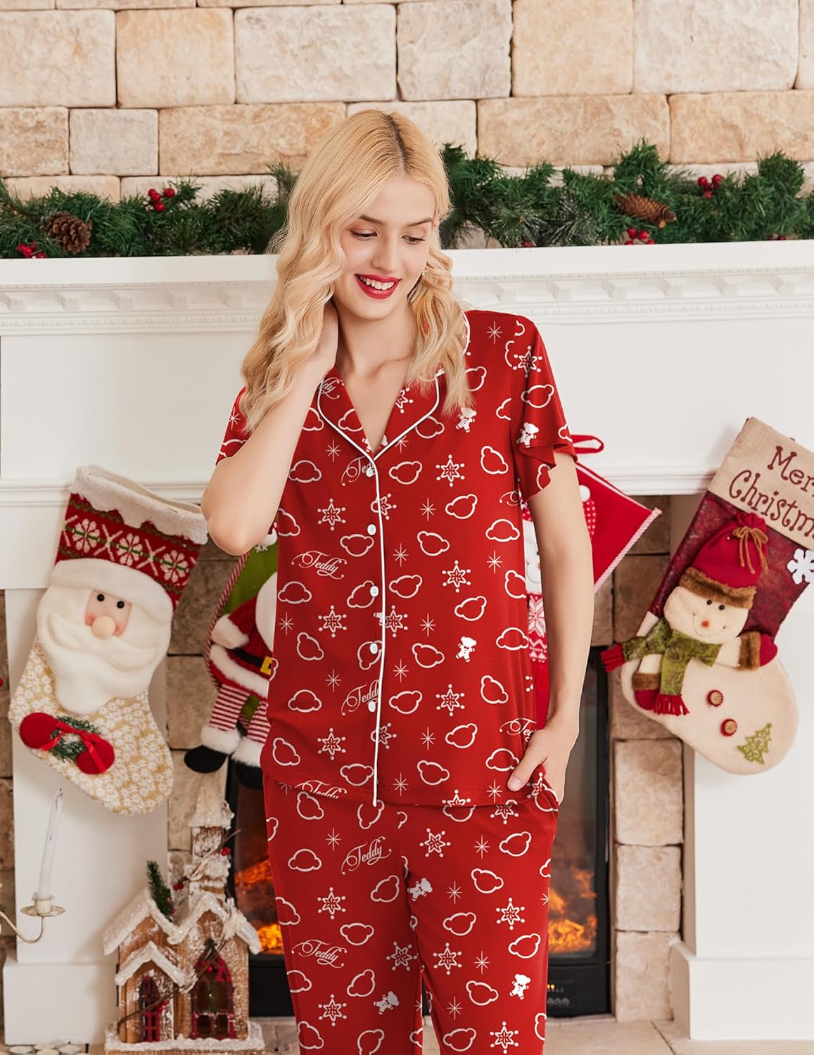 Red holiday pajama set with all-over white print, button front top and matching pants