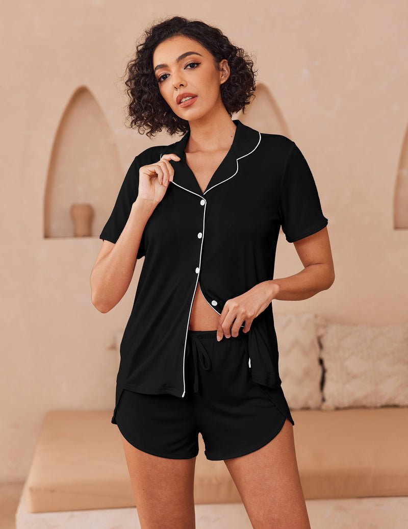 Black button-up pajama set with short sleeves, button front, and matching shorts