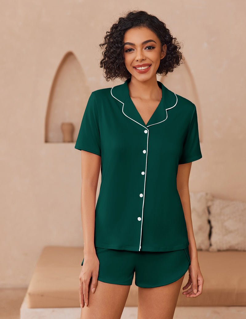 Green button-up pajama set with short sleeves, contrast piping, matching shorts