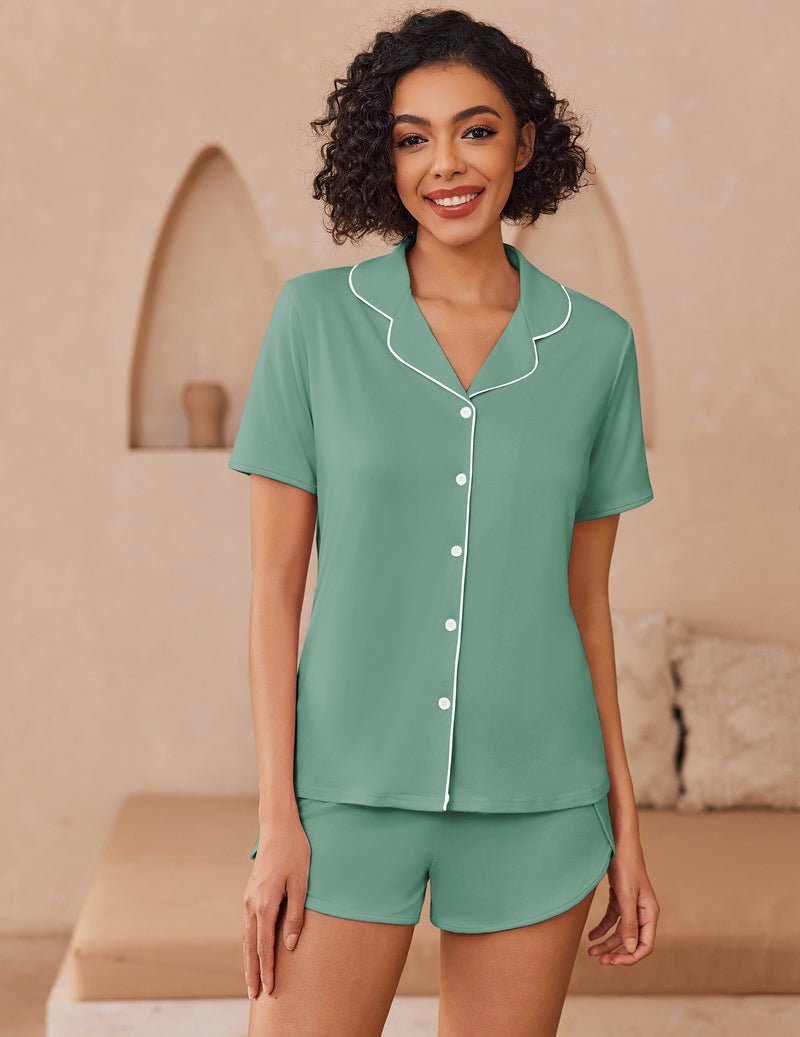 Light green button-up pajama set with short sleeves and matching shorts, white buttons