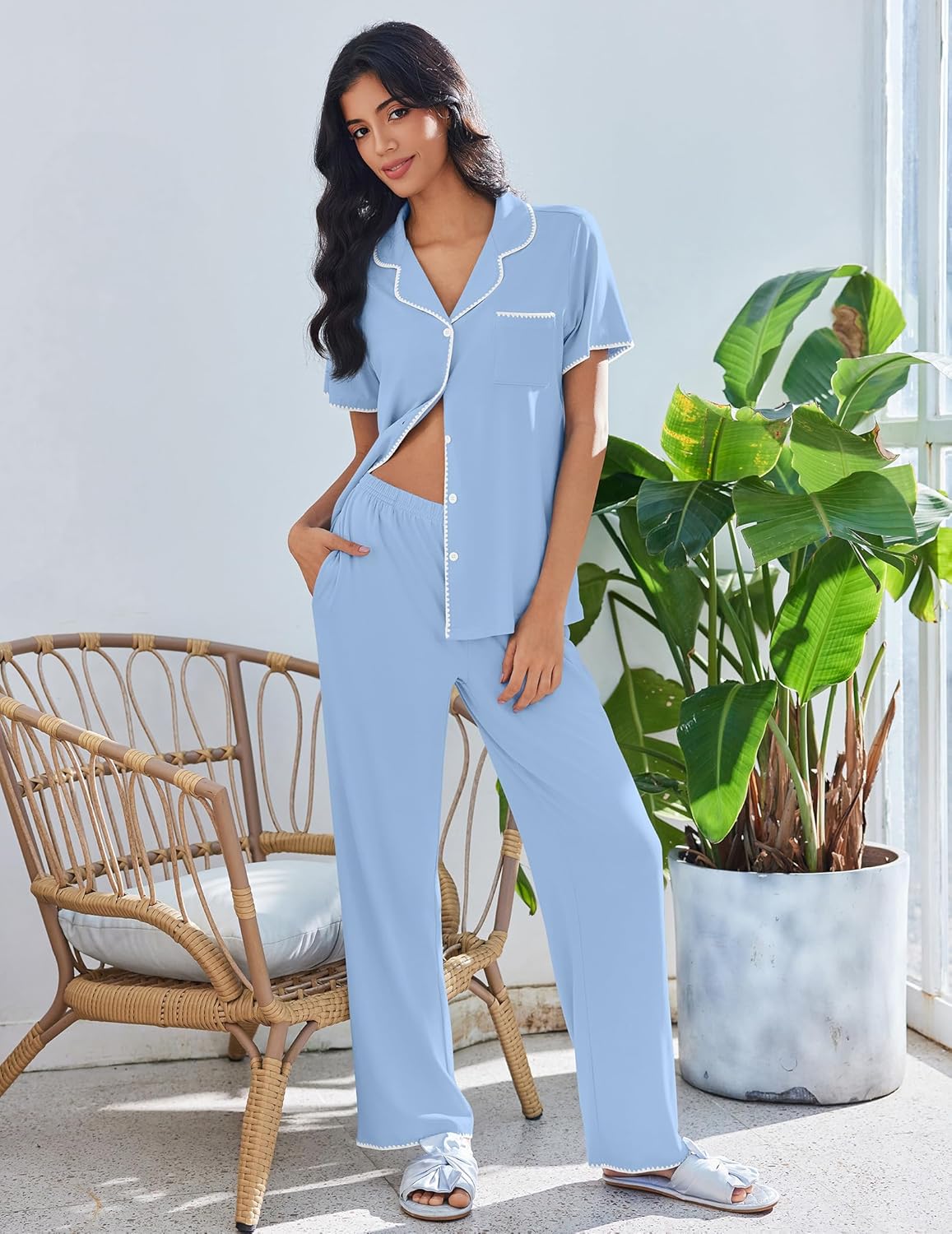Light blue button-up short sleeve pajama set with white piping and long pants